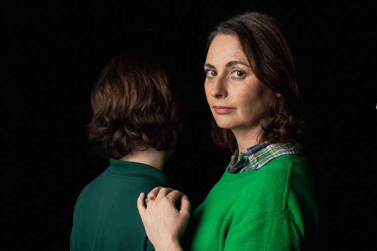 Lila Byock, founder of Schools Beyond Screens, with her son at her home in Los Angeles on Monday.