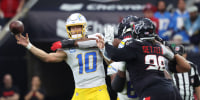 Jan 11, 2025; Houston, Texas, USA; Los Angeles Chargers quarterback Justin Herbert (10) passes during the second quarter against the Houston Texans in an AFC wild card game at NRG Stadium. Mandatory Credit: Troy Taormina-Imagn Images